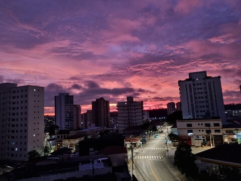 downtown city at dawn
purple pink sunrise