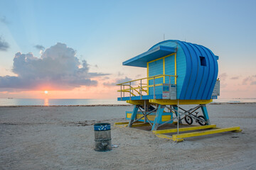 Sunrise Over the 3rd Street Art Deco Lifeguard Station on Miami Beach with Tranquil Ocean Waves and...