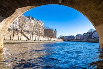 Paris, under the Pont-Neuf on the Seine, with the quai des Orfevres and the tribunal on the ile de...