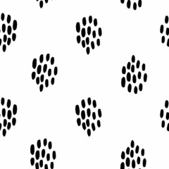 Seamless pattern with black spots 
on white background, hand drawing
illustration