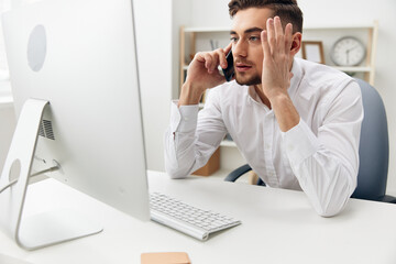 manager in a white shirt at the office work Internet workplace