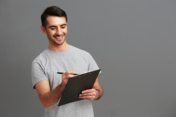 handsome man tablet for paper documents cropped view