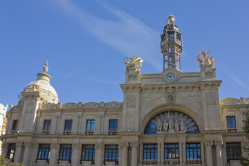 Fototapeta na wymiar Building of Central Post Office at Plaza del Ayuntamiento in Valencia, Spain 