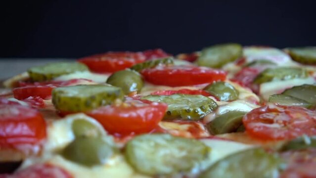 Slice pizza with mozzarella cheese, olives, pickled