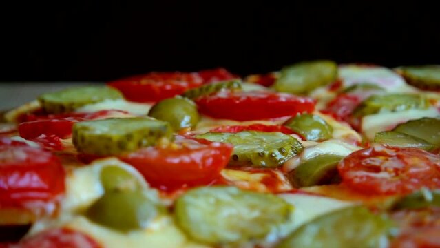 Slice pizza with mozzarella cheese, olives, pickled