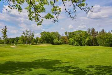 Fototapeta na wymiar View of Golf Course with beautiful green field.
