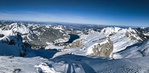 Beautiful mountain panorama from the mutteristock summit to the wagitalersee in the canton of...