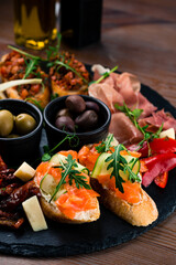 bruschetta with salmon close-up, Italian tosted bread with salmon and cheese