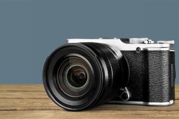 Classic vintage Camera on the wooden desk