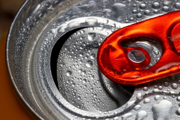 Extreme close up shot of pop can opener hinge, selective focus