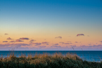 Sunset in the dunes by the North Sea
