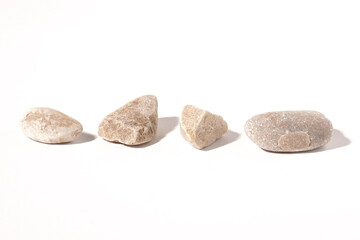 Fototapeta na wymiar Three pieces of raw rocks isolated on white