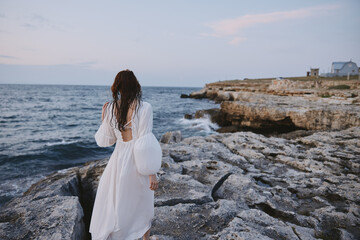 Woman in white dress nature landscape sea travel lifestyle