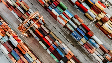 Foto op Canvas Aerial view of shipping container port terminal. Colourful pattern of containers in harbor. Maritime logistics global inport export trade transportation. © kasto