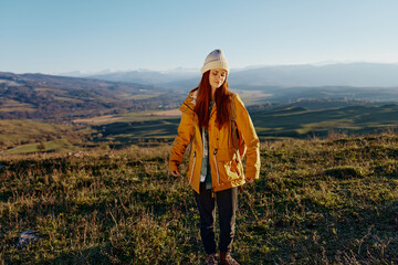 Fototapeta na wymiar woman traveler admiring the landscape mountains nature Lifestyle