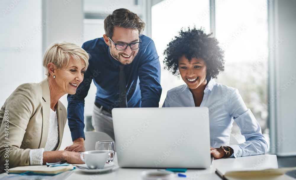 Poster its impossible until we show you that its possible. shot of a group of businesspeople working togeth