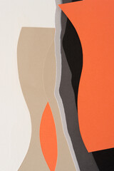 paper design suitable as a background with blank space featuring undulating lines in beige, gray, and orange