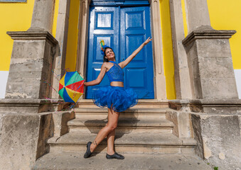 Beautiful Latin dancer dressed up for Carnival on the streets of Olinda. Frevo Recife. Brazil...