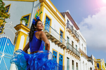 Beautiful Latin dancer dressed up for Carnival on the streets of Olinda. Frevo Recife. Brazil...