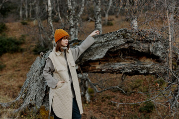 tourist in autumn clothes nature trees travel life style