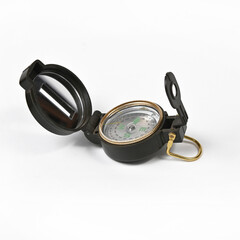 Tourist magnetic compass with a heliograph on a white background.Isolate.