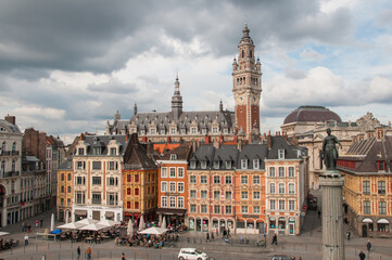 Fototapeta premium Lille, France, May, 2012. Place du General de Gaulle (Grand Place). Historic city center with clock tower, buildings, Goddess statue. Lille, France. 2012. Editorial use only.