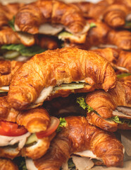 Set of coffee break in the hotel during conference meeting, with tea and coffee catering, decorated catering banquet table with variety of different pastry and bakery, with croissants and cookies