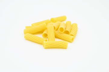 Raw Tortiglioni pasta, isolated on a white background