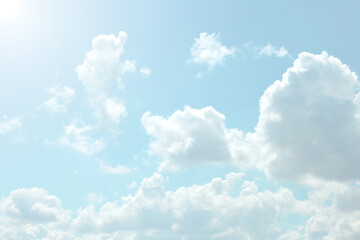  Sky. White clouds in a light blue sky. The sky is in very light pastel colors. Heaven background.