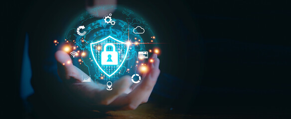 Businessman's hand holding virtual screen padlock and cloud computing global network cyber security data protection business technology privacy concept, Protection internet and clouds business.