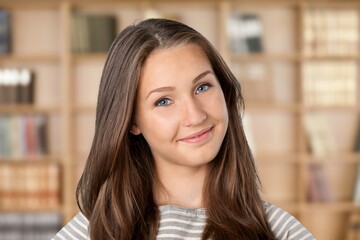 Headshot portrait of smiling professional female advisor, business lady coach looking at camera