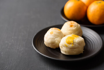 Thai mooncake or Chinese pastry on black background