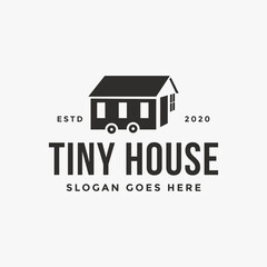 Fototapeta Minimalist tiny house trailer logo vector icon on white background obraz