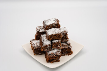 Brownies on white plate and white background