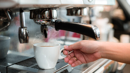 black coffee morning on a coffee maker