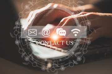 Contact us or Customer support hotline people connect. Businessman using a laptop with contact icons