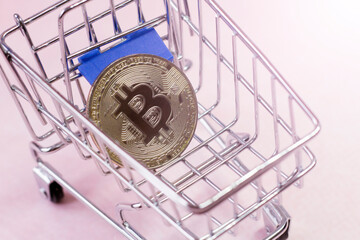 Gold Bitcoin in the shopping cart