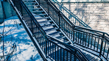 Snow covered urban stairs with snow