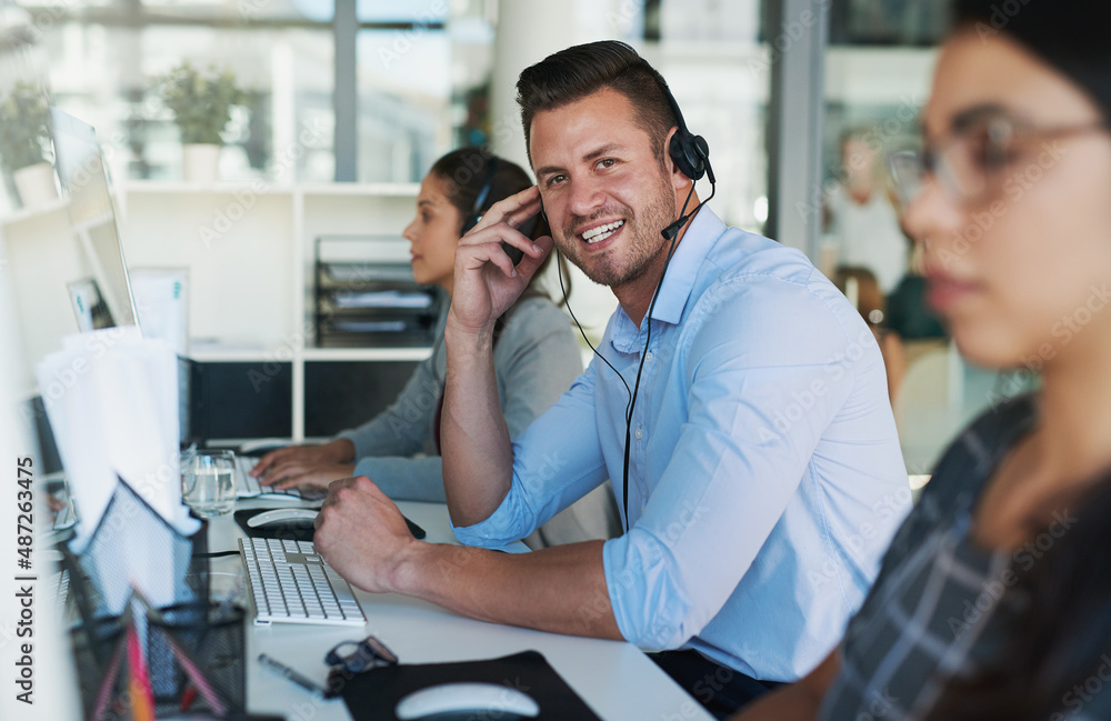 Aufkleber customer care you can count on. portrait of a happy and confident young man working in a call center