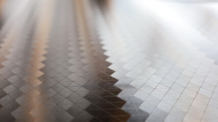 Tile floors in dark and light tones. Modern square floor tiles that reflect light create different...