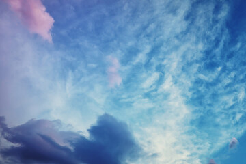 High clouds in the summer sky. Sky background. Meteorological observations of the sky.