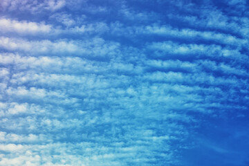 Fototapeta na wymiar High clouds in the summer sky. Sky background. Meteorological observations of the sky.