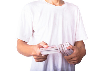 A man holding Thai banknotes on a white background, clipping paths