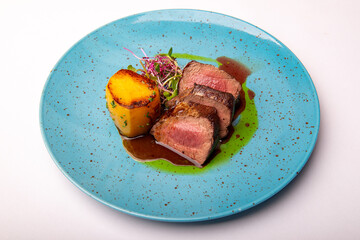 Venison sirloin steak, potato fondant and port wine sauce