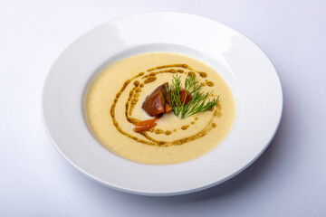 Roasted patison soup, with pickled mushrooms and rosemary oil
