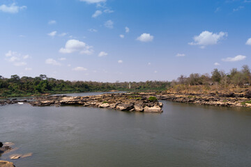 Mekong river showing rock formations formed by water erosion over thousands of years showing more...