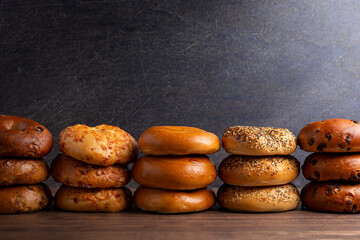  Variety of Different Flavored Bagels on a Wood Table