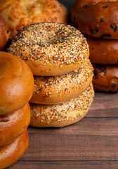  Variety of Different Flavored Bagels on a Wood Table