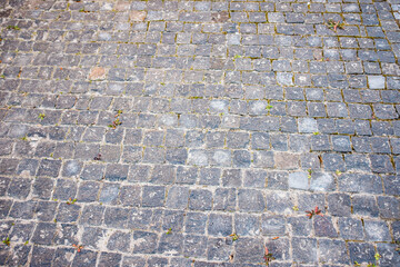Abstract background of cobblestone pavement close-up