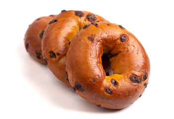 Three Golden Chocolate Chip Bagel on a White Background